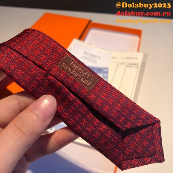 Hermes Faconnee H tie in hand-sewn silk